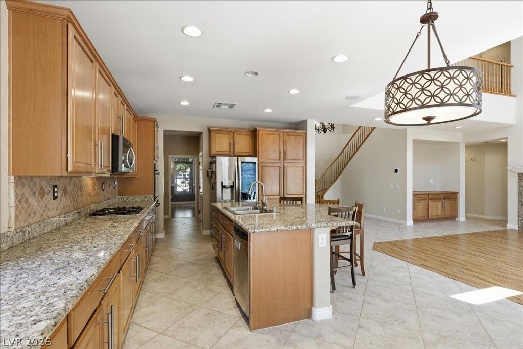 7025 Puetollano Drive — photo 2 of 35