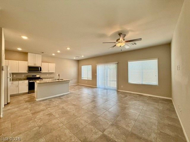 7606 Red Plumeria Avenue — photo 2 of 24