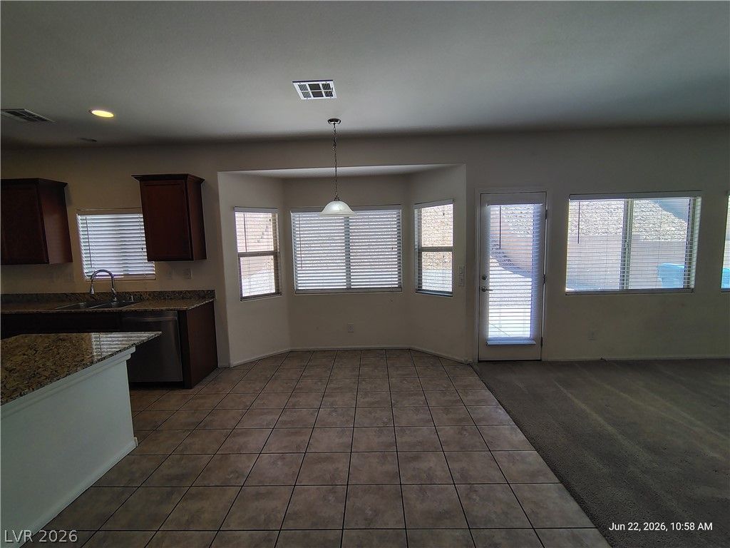 8166 Minots Ledge Avenue — photo 4 of 18