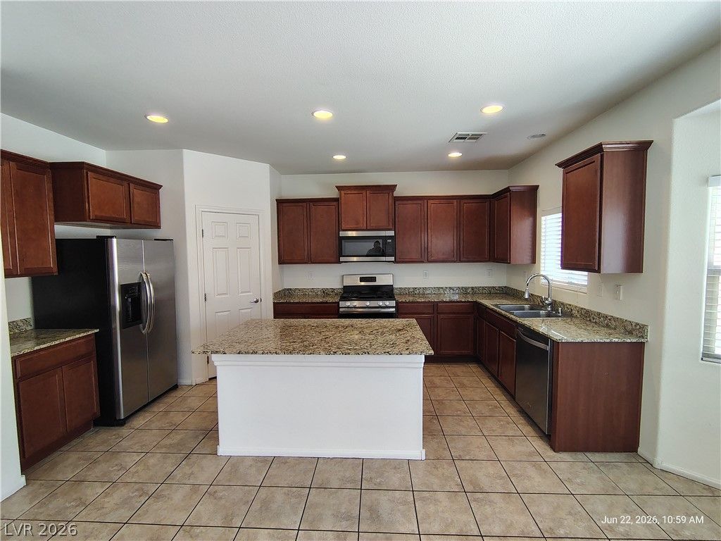8166 Minots Ledge Avenue — photo 5 of 18