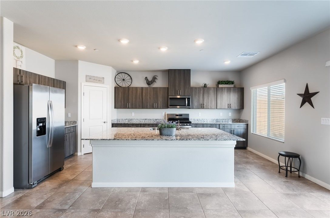 7100 Woodrow Ranch Street — photo 5 of 32