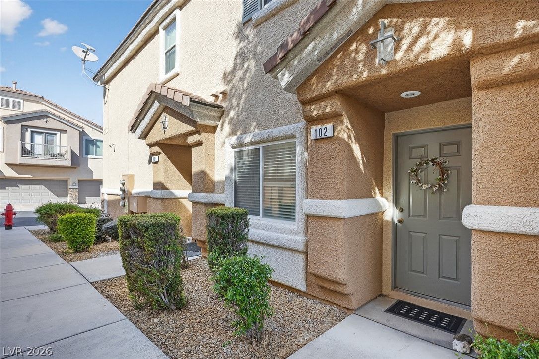 8725 Traveling Breeze Avenue 102 — photo 3 of 32