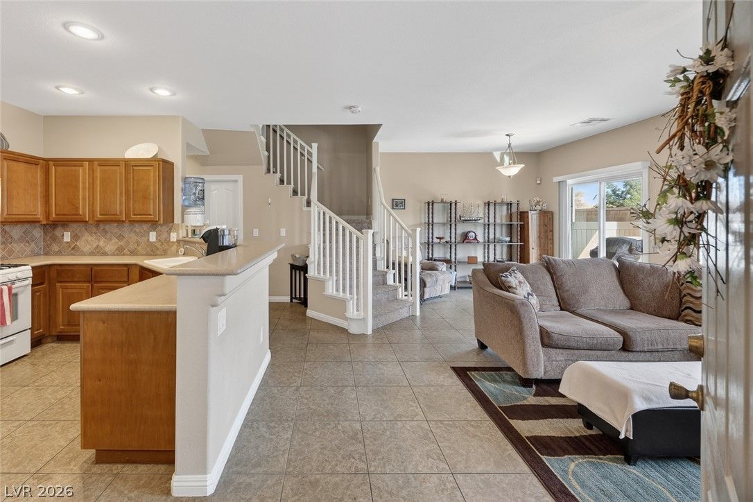 8725 Traveling Breeze Avenue 102 — photo 4 of 32