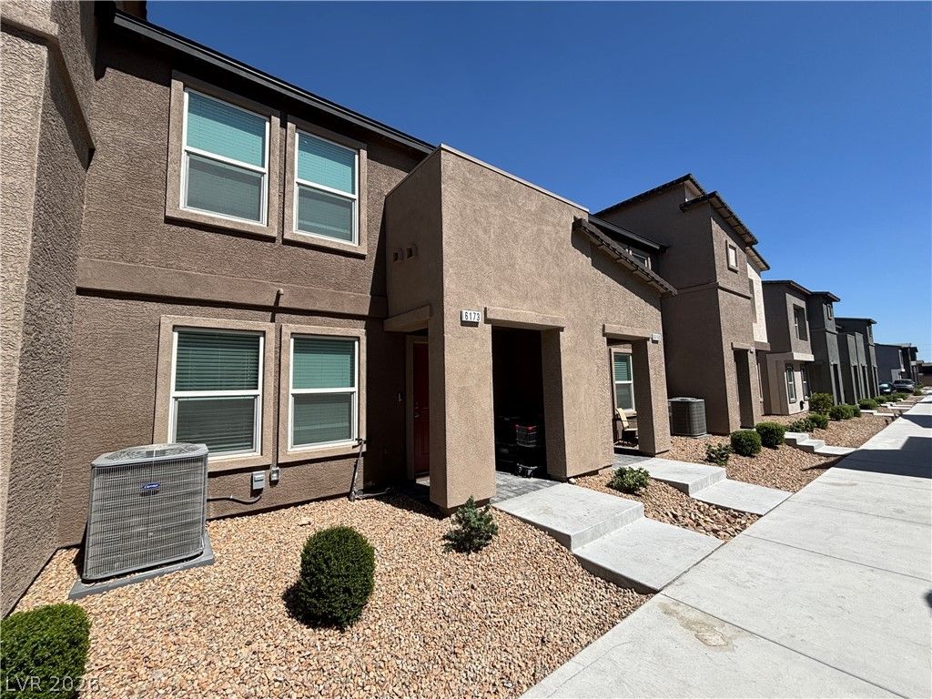 6173 Hibiscus Garden Street — photo 1