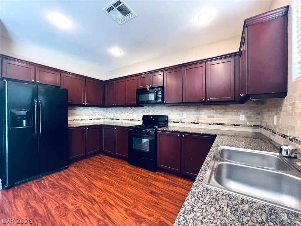 6694 Aviston Street — photo 3