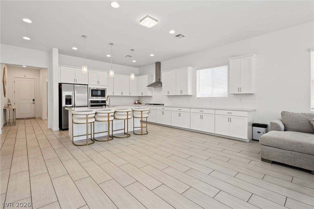 10205 Tumbaga Street — photo 3 of 27