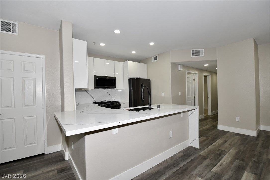 7173 South Durango Drive 203 — photo 2