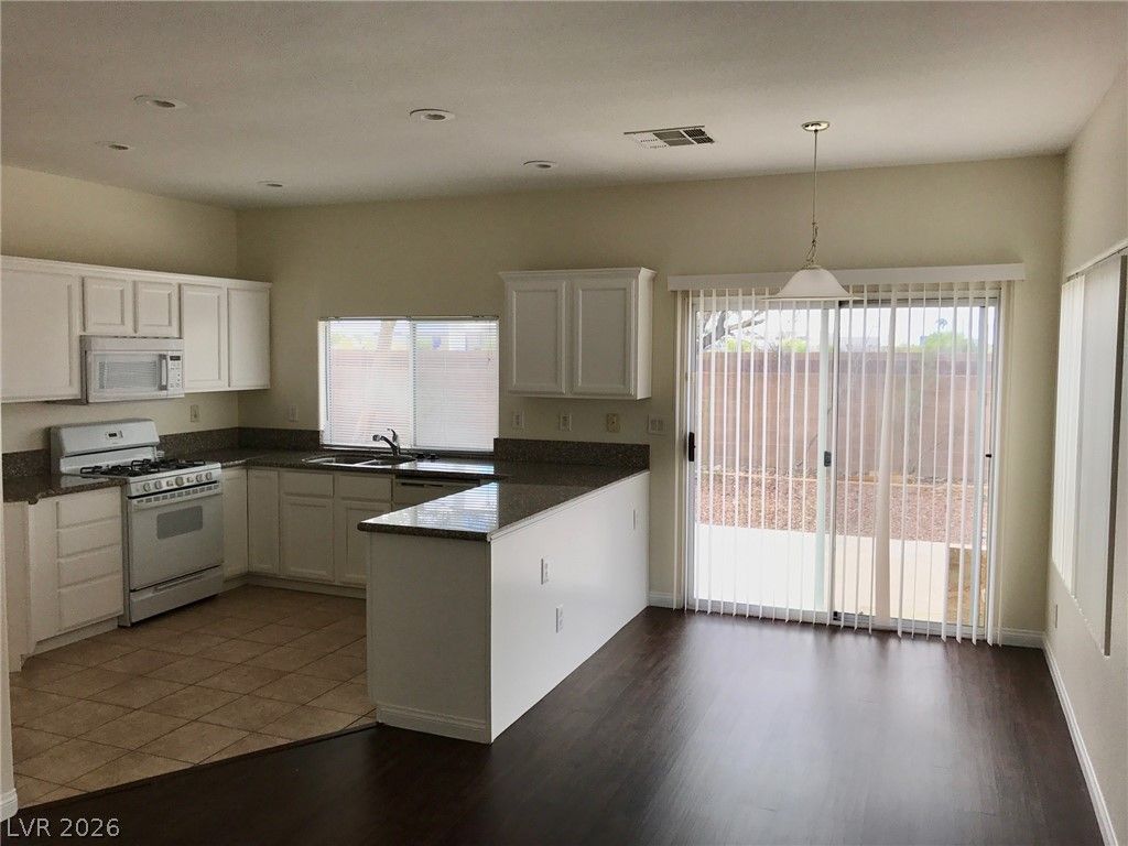 7026 Rustling Winds Avenue — photo 4 of 14