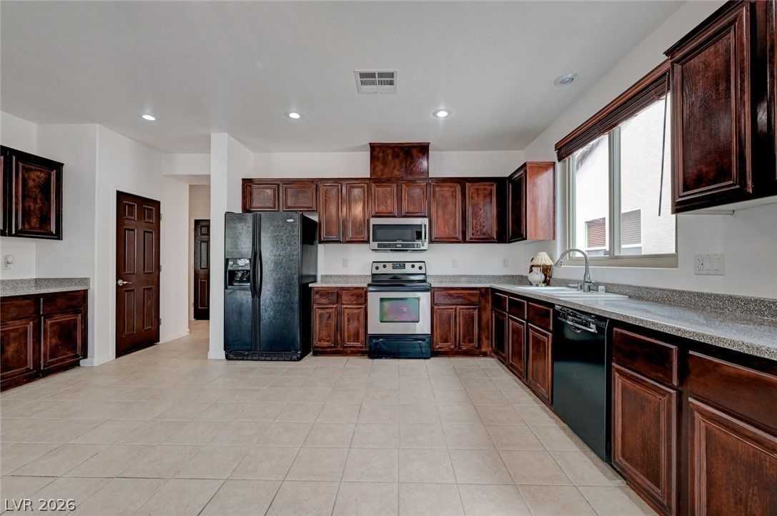 5893 Wildhorse Ledge Avenue — photo 3