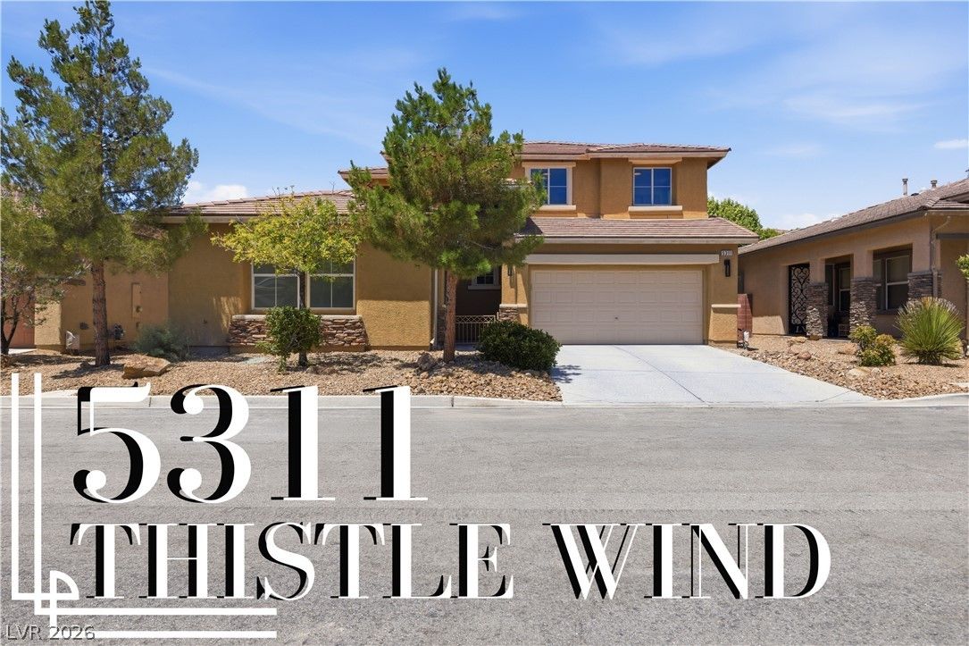 5311 Thistle Wind Drive — photo 1 of 15