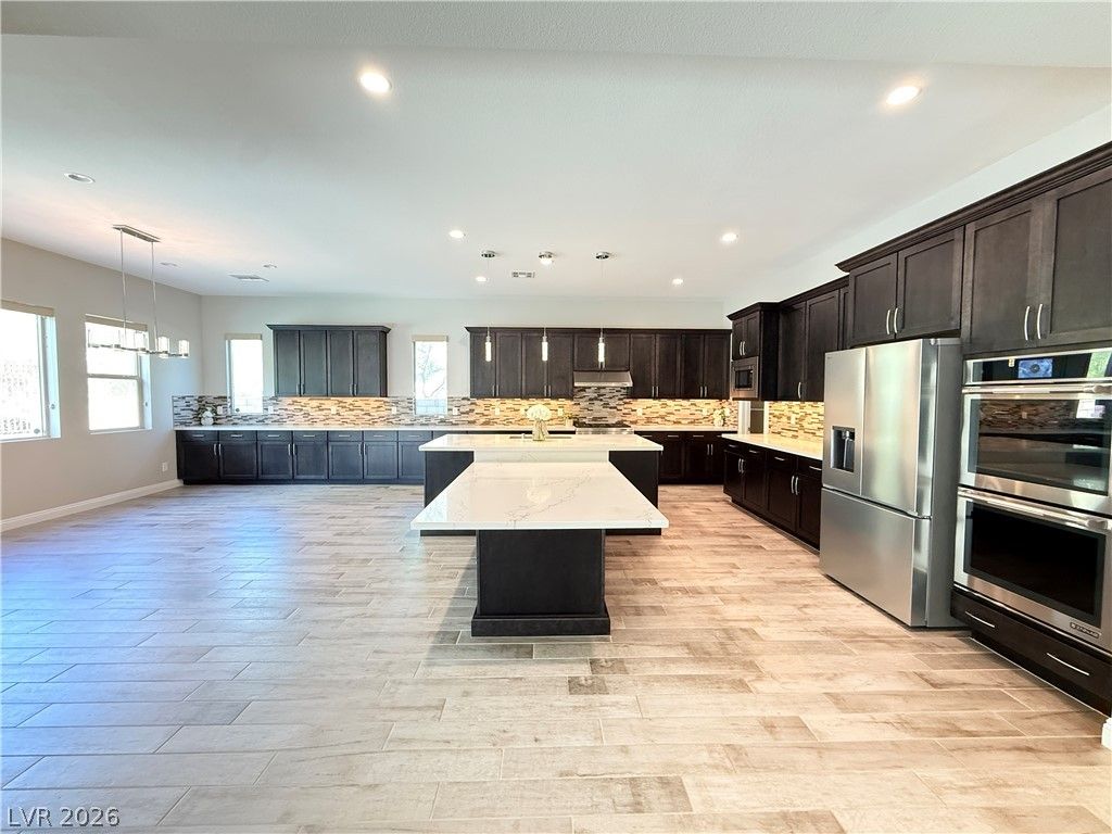12006 Vento Forte Avenue — photo 5