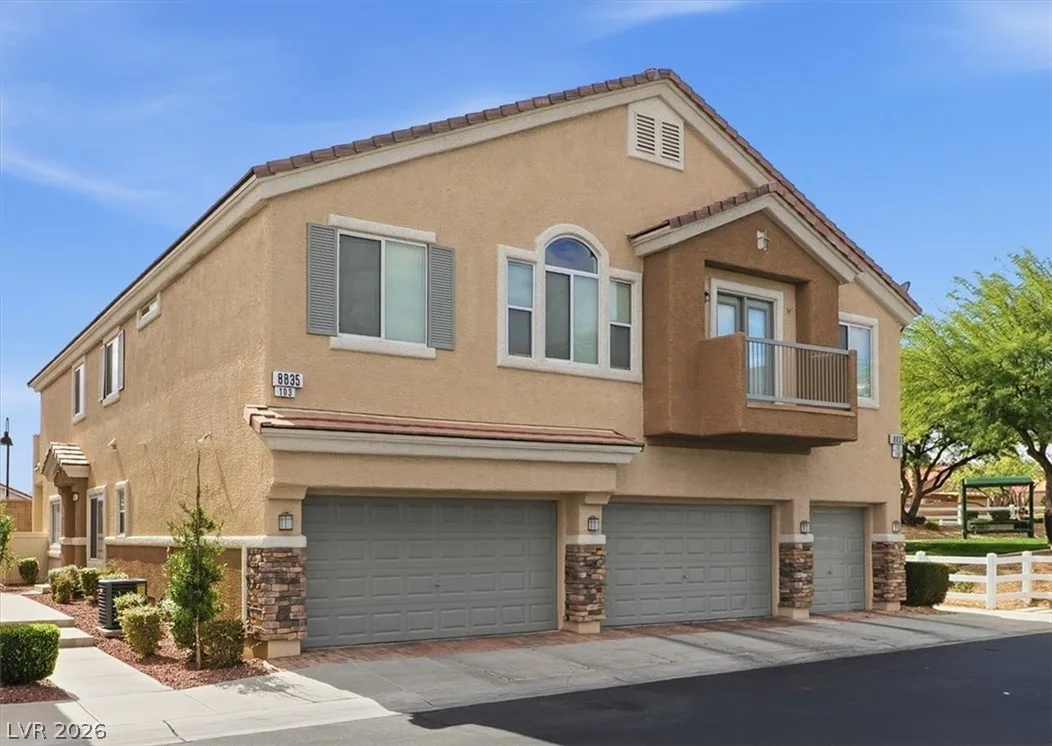 8835 Traveling Breeze Avenue 103 — photo 1