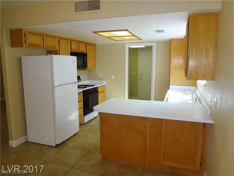 7509 Bowles Drive — photo 4